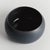 Simple in form with a modern aesthetic, this decorative bowl is the definition of less is more. Finished in a smooth dark...