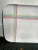 The fun early 90s plastic tray, serving tray with rainbow lines intersecting near one corner. Would make great wall art...