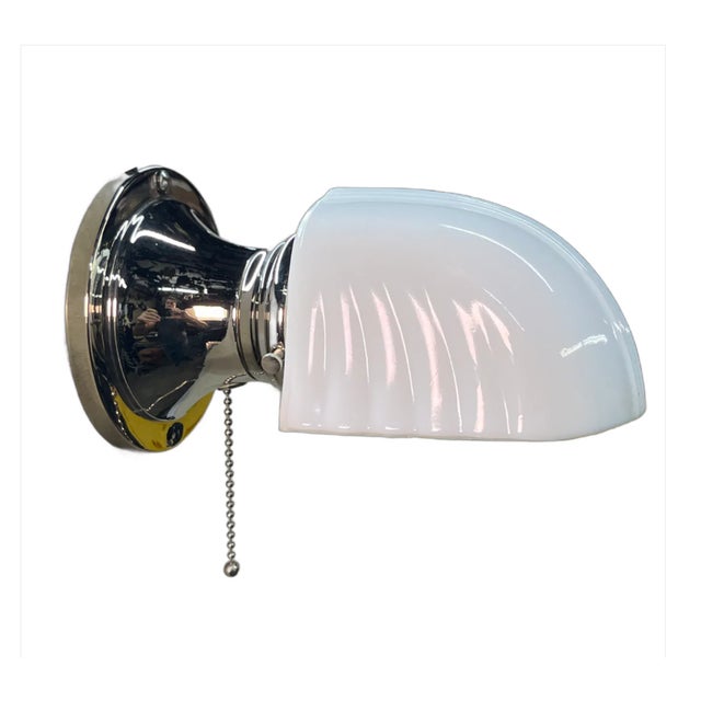 New nickel plating on fixture with new pull chain socket. 4.5" by 4.5" by 8.5".