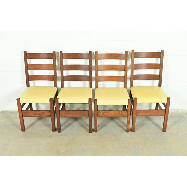 An exceptional set of four antique Mission or Arts & Crafts period ladder back dining chairs By Gustav Stickley USA, Early...