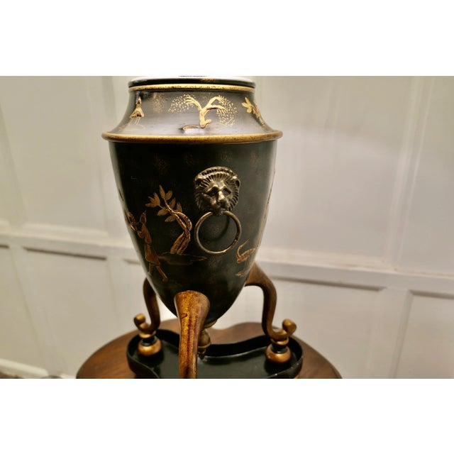 Large Chinoiserie Toleware Table Lamp, Black and Gold Lacquer A Large Stunning Lamp with it’s original shade is in the...