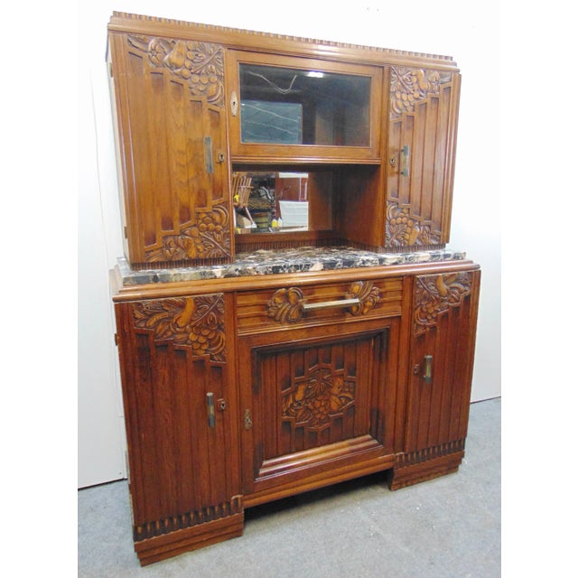 French Art Deco Walnut 2-pc Marbletop Sideboard. Top section with center with glass door in front of beveled mirror...