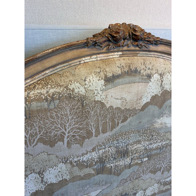 20th Century French Louis XV Provincial Upholstered Bed with Floral Carvings. Distressed Wood with lightly antiqued...