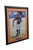 Vintage framed, autographed photo of former Cincinnati Bengals wide receiver Chad Johnson Ochocinco, featuring an orange...