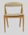 Set of ten model 31 dining chairs in oak designed by Kai Kristiansen for Schou Andersens Møbelfabrik in 1956. The chairs...