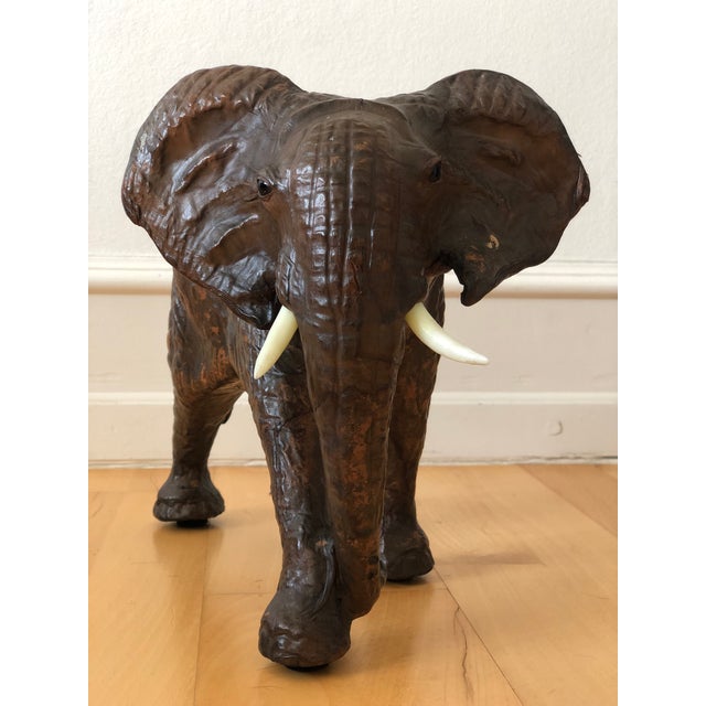 This exquisite leather elephant statue is a beautifully handcrafted piece, showcasing exceptional detail and artistry....