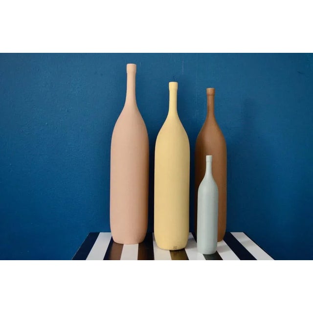 Large, colorful, textured and spectacularly decorative, this magnificent series of vases lends itself to all ornamental...