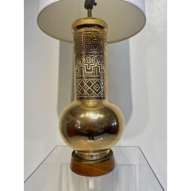 Vintage Gilded Ceramic Lamp, in the Hollywood Regency Egyptian Revival Style. This Stiffel tablelamp has unique...
