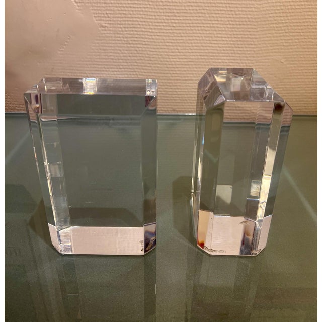 Pair of Ritts bookends Made of astrolite lucite, 1970s Dimensions: 16cm x 7cm Very good condition Their sculptural,...