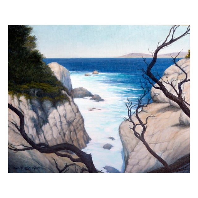 Detailed seascape of an ocean view framed by rocks and tree branches at Point Lobos, California by Max Flandorfer...