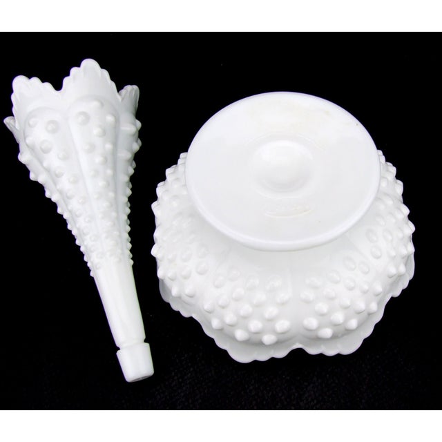 Add classic vintage elegance to your home with this **Fenton Hobnail Milk Glass Epergne with Single Horn**. Featuring...
