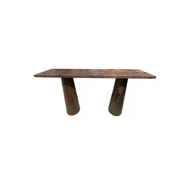A sculptural teak wood console table crafted from solid teak wood. The table top sits atop two solid, legs. A wonderfully...