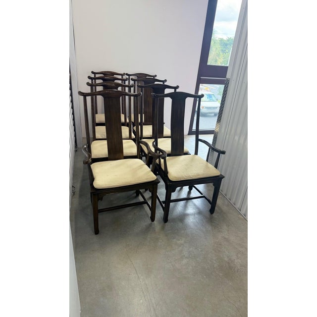 Authentic Drexel Heritage dining chairs, offered as a set of eight, including six side chairs and two armchairs. Crafted...