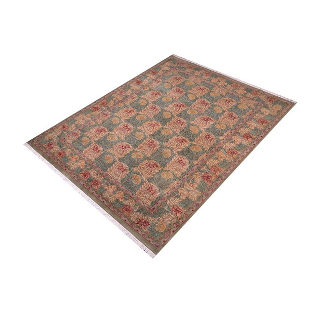 Designed with mesmerizing intricacy and gorgeous color palette, this hand-knotted masterpiece demonstrates the beauty and...