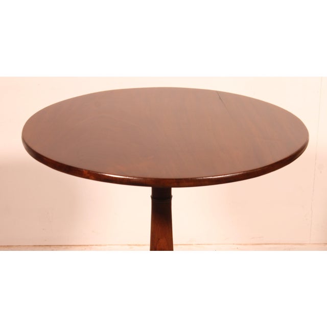 Elegant English mahogany side table, circa 1800. This small, unusual model, being smaller and lower than usual, is known...