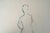 Drawing on paper, double-sided, depicting a silhouette and a reclining figure, 20th century. Drawing on paper, double-...
