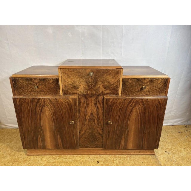 Art deco english burr walnut cocktail sideboard – circa 1930s a stunning original english art deco cocktail sideboard...