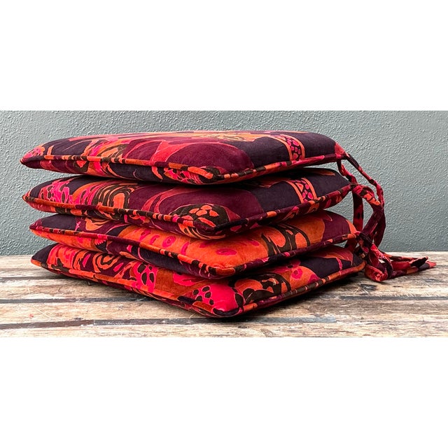 Embody the spirit of 1980s haute couture with this rare set of four Yves Saint Laurent printed velvet chair cushions....
