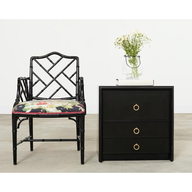Rare pair of mid-century modern black lacquered nightstands designed by Paul Frankl for John Stuart, Inc. The square...