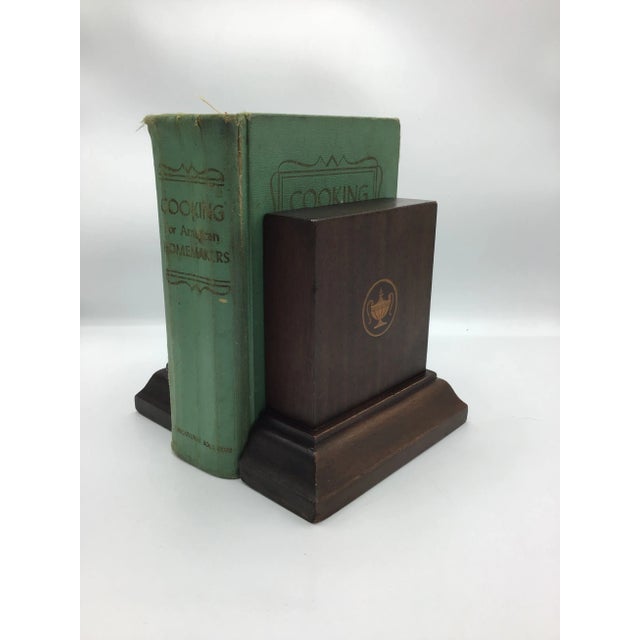In the style of George Hepplewhite, this antique pair of neoclassical/empire solid mahogany bookends are a fine example of...
