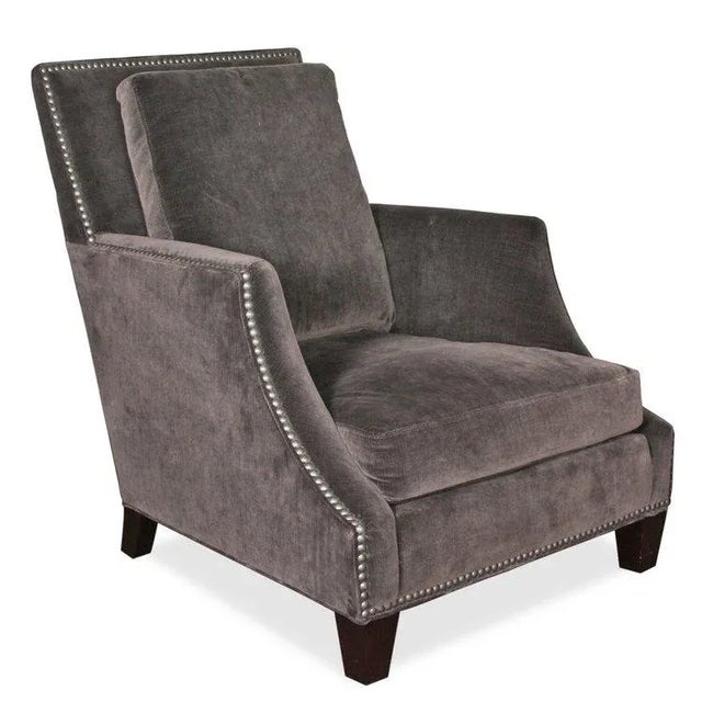 A classic silhouette with clean lines, this transitional chair is simple yet luxurious with its soft velvet upholstery in...