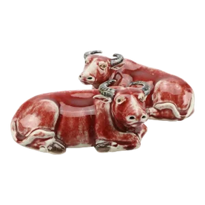 Antique Early 20th Century Chinese Export Porcelain Models of Water Buffalo in Sang De Boeuf Oxblood Glaze - a Pair