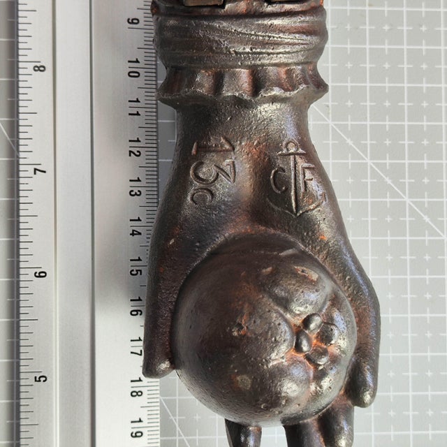 Discover a truly exceptional piece of French architectural salvage: an authentic 19th-century cast iron door knocker,...