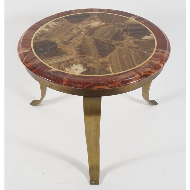 Muller's of Mexico round onyx and brass frame side table with scroll form legs. Darker round center with lighter onyx...