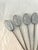 Vintage set of eight Towle silver shaded stainless steel skewers featuring a raised lobster motif at top. In original boxes.