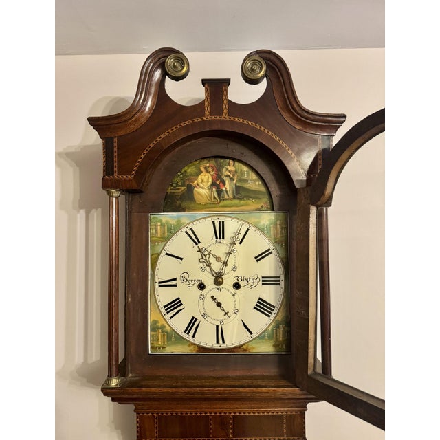 Quality antique George III oak and mahogany banded long case clock, having a swan neck pediment above a beautiful painted...