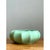 This bowl embraces a soft, organic silhouette, its wide, rounded body gently compressed into a low, horizontal form...