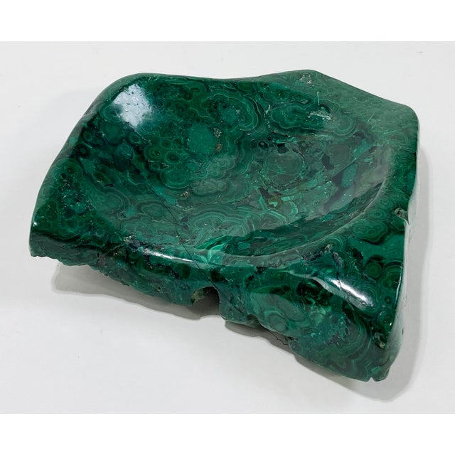 Vibrant rich green tones to this polished malachite stone trinket dish. Hand carved with a wonderful organic form. Great...