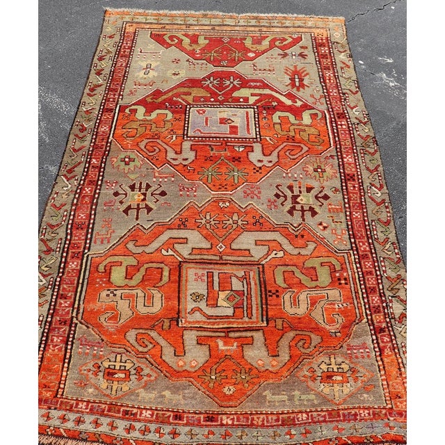 Measures: 4'4 x 8'1 Antique Caucasian Kazak Rug with Bold Geometric Medallion Design 4'4 x 8'1. Keivan Woven Arts/...