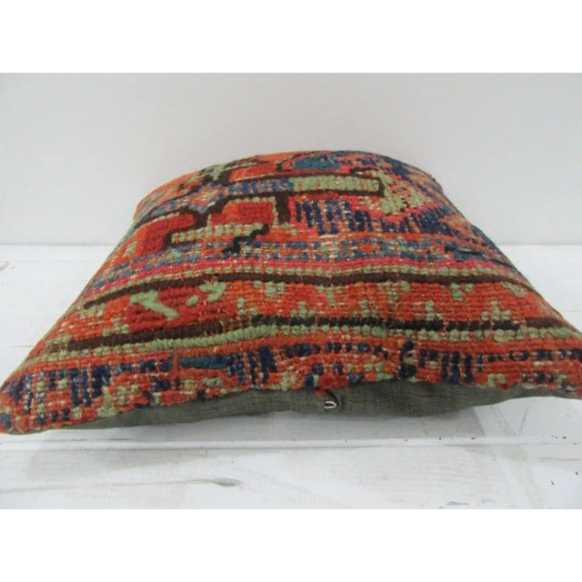 This is a pillow cover made from a vintage kilim rug. The piece was properly washed and ready to use. Pillow inserts not...