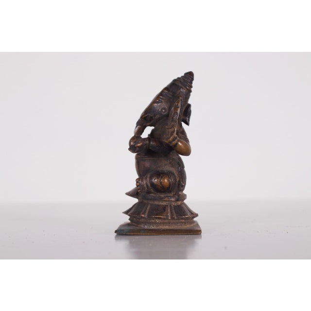Statuette of Ganesh depicted with four arms, copper alloy, India, Orissa (Odisha), 17th century. Dimensions: H 8.5 cm x W...