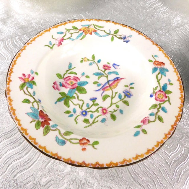 This is a set of five rimmed soup or cereal bowls by John Aynsley and Sons in pattern number 5683 with raised enamel...