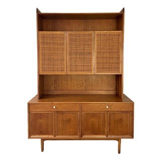 A Beautiful Mid Century Modern Walnut and Cane Hutch Designed by Kipp Stewart for Drexels “Declaration” Line, Circa 1960s For Sale