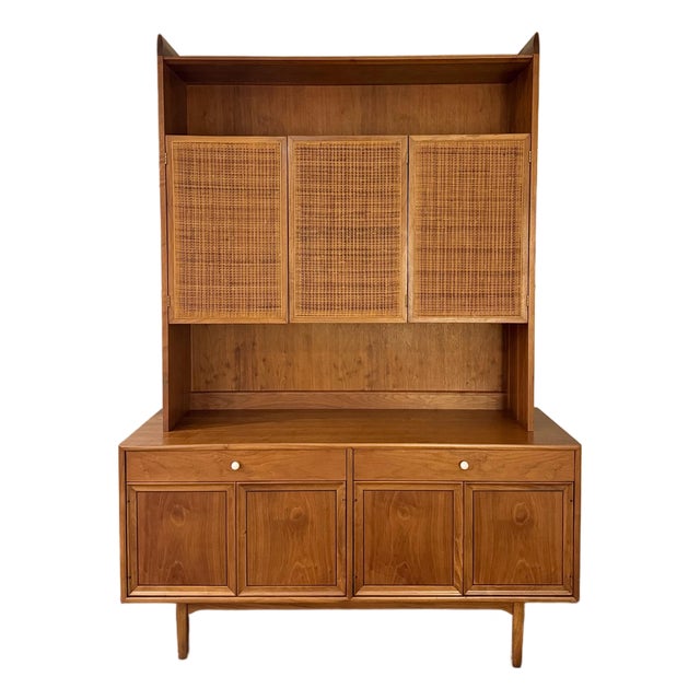A Beautiful Mid Century Modern Walnut and Cane Hutch Designed by Kipp Stewart for Drexels “Declaration” Line, Circa 1960s For Sale