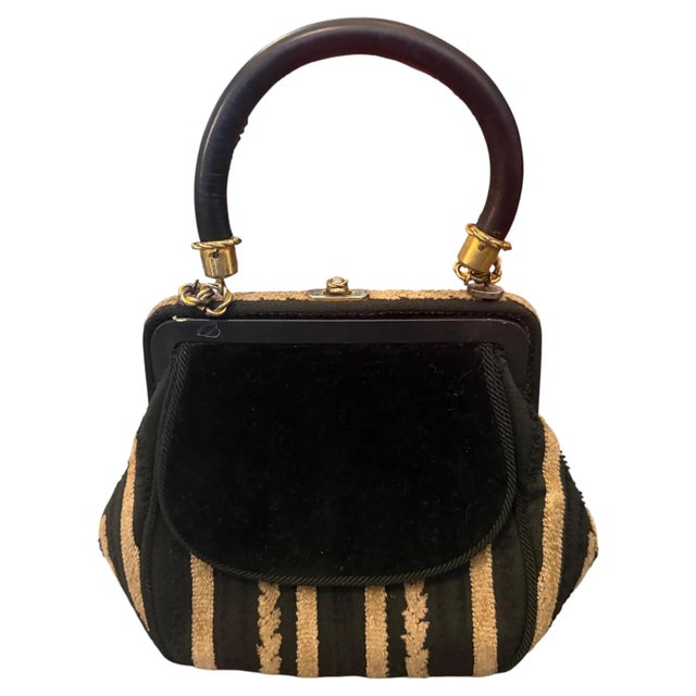 This authentic 1950s Italian top handle handbag captures the iconic elegance reminiscent of Roberta di Camerino's mid-...