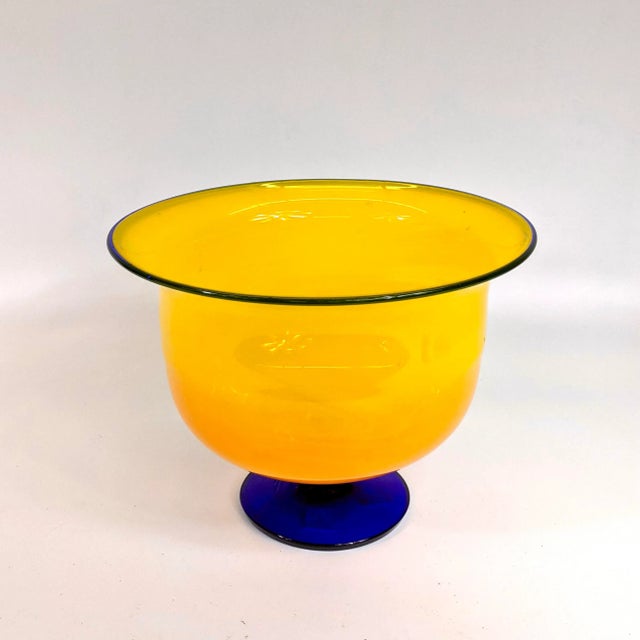 A beautiful yellow and cobalt blue hand blown art glass.