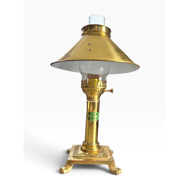 Vintage brass table lamp inspired by the legendary Paris–Istanbul Orient Express, featuring an ornate brass construction,...