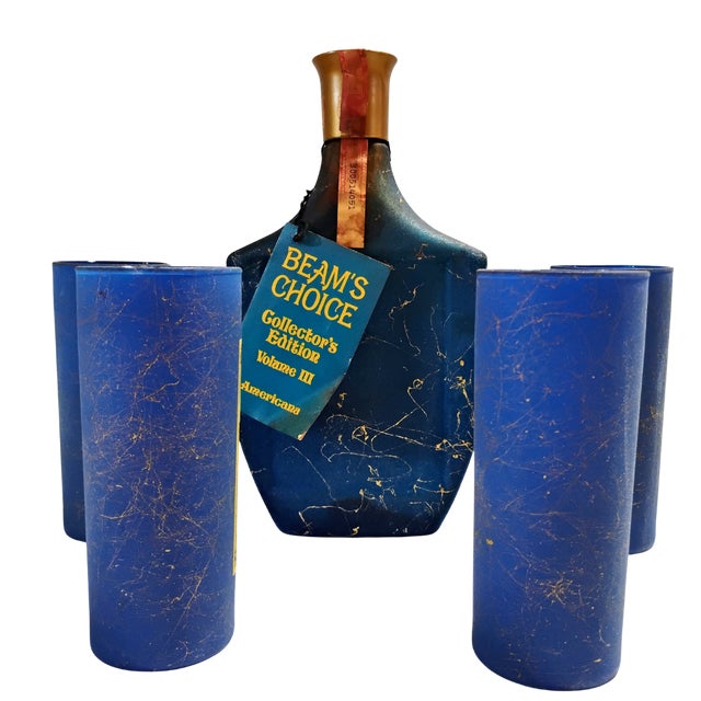 This vintage 1968 Jim Beam "Beam's Choice" Collector's Edition Volume III decanter set features a striking cobalt blue...