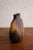 Royal Haeger flask form silhouette vase from the "Earth Wrap" series. Brown base coat with abstract textured yellow and...