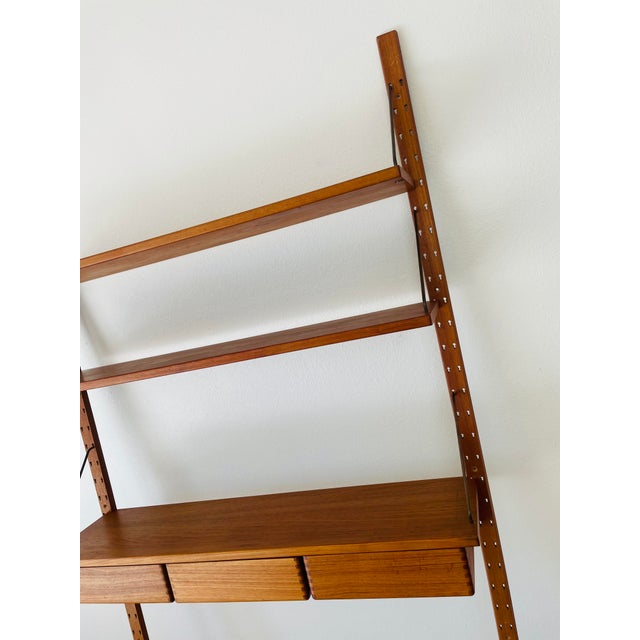 Brown Vintage 1960s Danish Modern Teak Wood Omnibus Wall Shelving Unit by Sven Ellekaer For Sale - Image 8 of 15