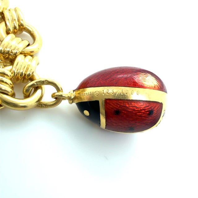 Early 21st Century Fabergé, 18k Yellow Gold and Enamel Egg Charm Bracelet For Sale - Image 5 of 7