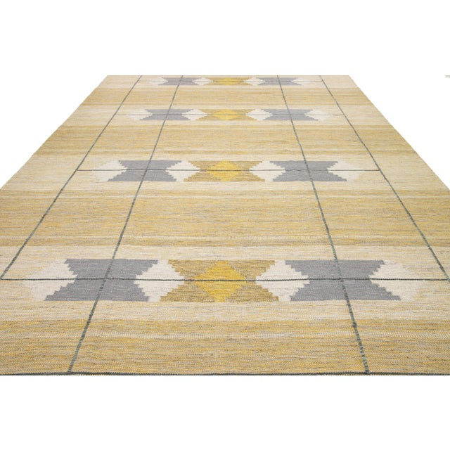 Experience the allure of this exquisitely crafted Swedish-style rug, hand-knotted with care from top-quality wool. Its...