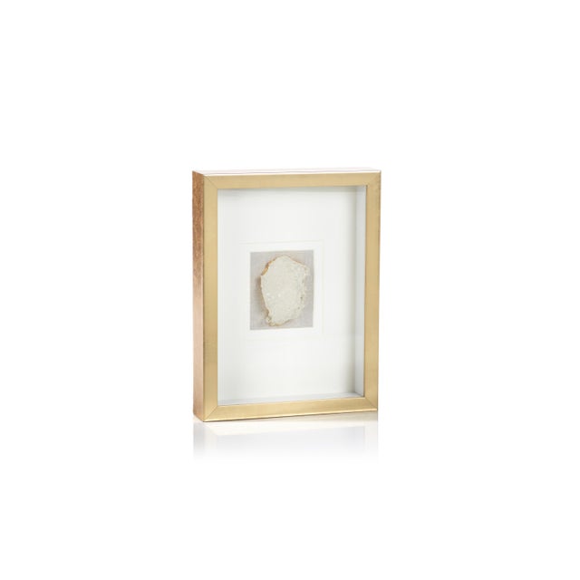 Add an elegant touch to your décor with this very unique framed crystals. The crystal is artificial but quite detailed...