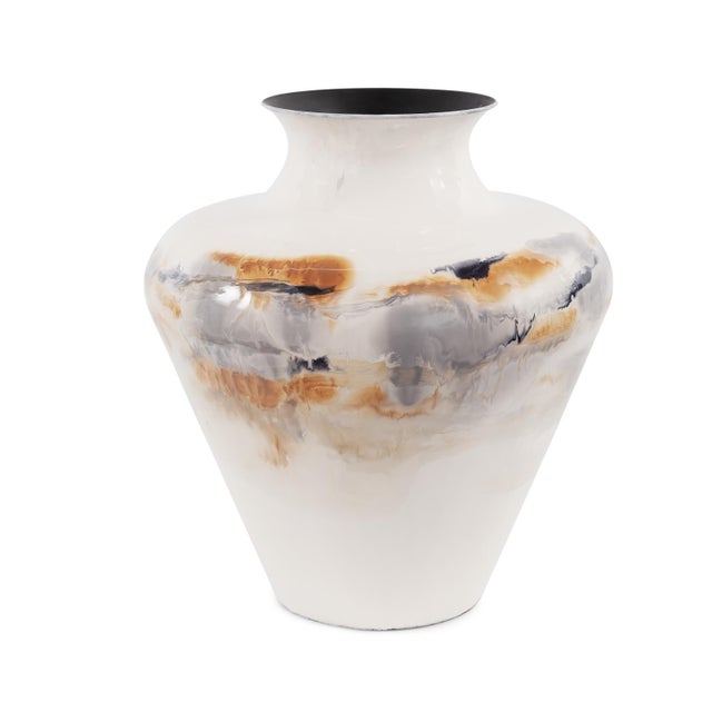 Inspired by the volcanic lava flows that occur when cool and hot debris is combined together. The Lahar iron vases are...