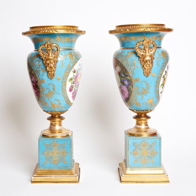 Discover the timeless elegance of this antique gilt bronze-mounted urn by renowned French maker Jacob Petit, dating back...