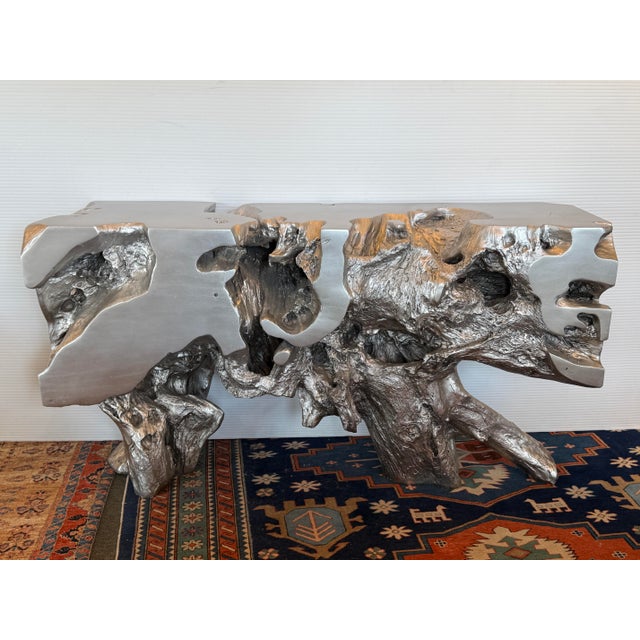 Design Plus Gallery presents the Freform Silver Leaf Console Table in Phillips Collection. An irregular planar top...